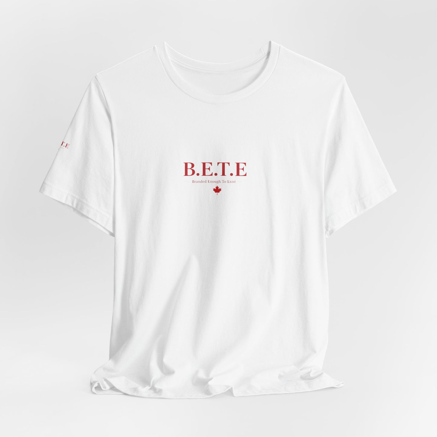 White t-shirt with 'B.E.T.E.' text on a light gray background
