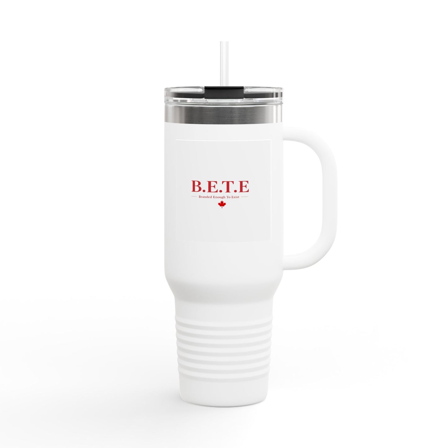 White travel mug with red text and a maple leaf on a white background