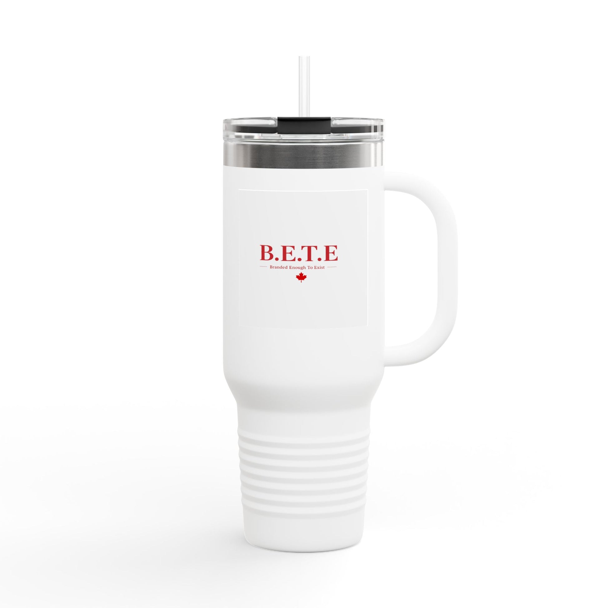 White travel mug with red text and a maple leaf on a white background